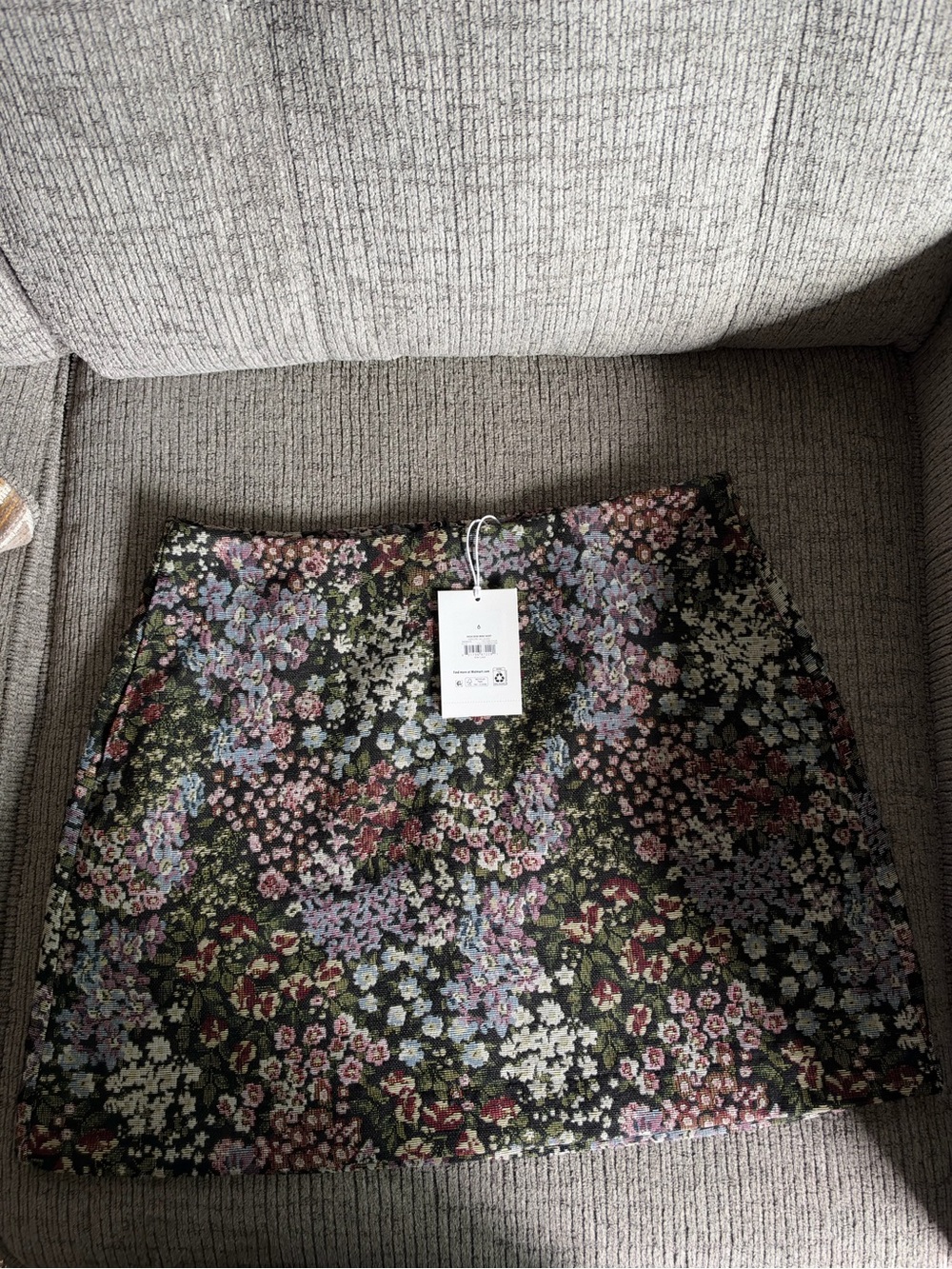 Floral Mini Skirt in Black with Pastel Blooms